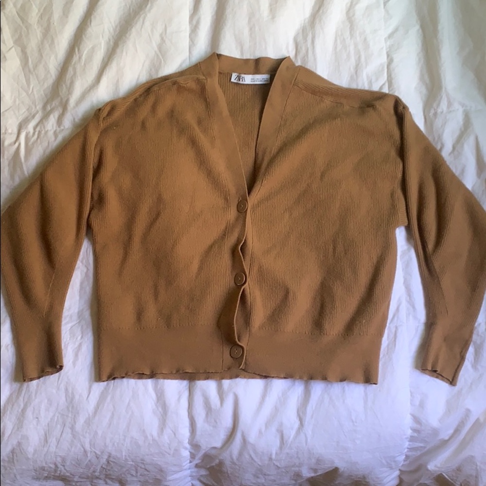 Tan button up  sweater.